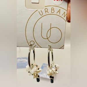 Urban Outfitters silver tone hoop earrings with white and black crystal dangles.